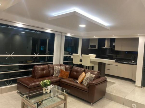 Hermosa SUITE con Estacionamiento gratuito